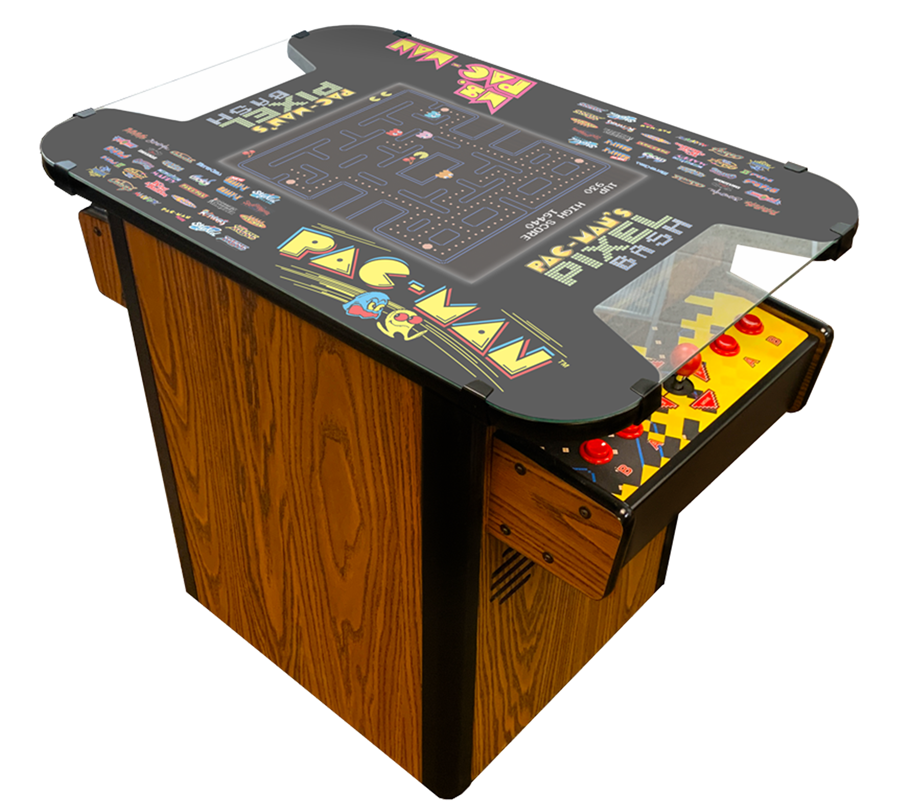 A commercial version of the Namco Pac-Man Pixel Bash arcade game in a cocktail cabinet format, featuring a color display with game graphics and a traditional wooden arcade cabinet.