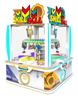 A colorful and vibrant view of the Sega SKILL FALL REVOLUTION 4 PLAYER arcade machine featuring a transparent cabinet with bright interior lighting, a rotating prize pedestal, and the game's name displayed at the top.