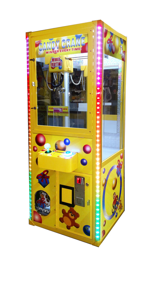 Yellow claw crane arcade machine with colorful lights and toys on a white background