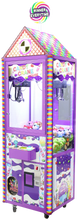 Colorful claw crane arcade game with cartoon character on a white background