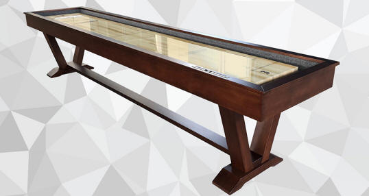 A wooden shuffleboard table with a clear coat finish, featuring a classic CL Bailey logo at each end, and hinges on the sides for folding the tabletop.