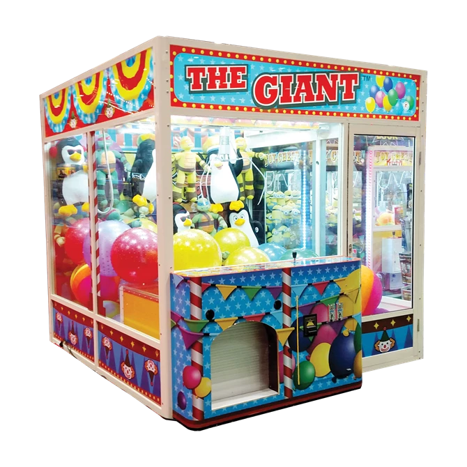 Colorful claw machine with toys inside on a white background