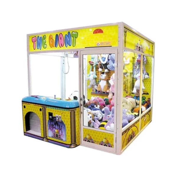 Toy claw machine with colorful design and 'The Giant' branding on a white background