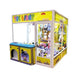 Toy claw machine with colorful design and 'The Giant' branding on a white background