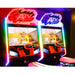 Two ATV arcade games with colorful lights on a dark background