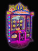 Glowing claw machine with colorful lights and toys inside, themed 'Taj Mahal'.